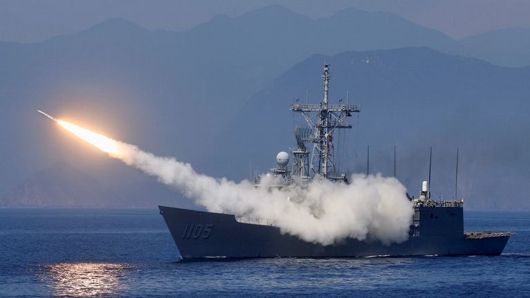 A missile is fired from a Taiwanese ship as part of exercises simulating intercepting and attacking an invading force