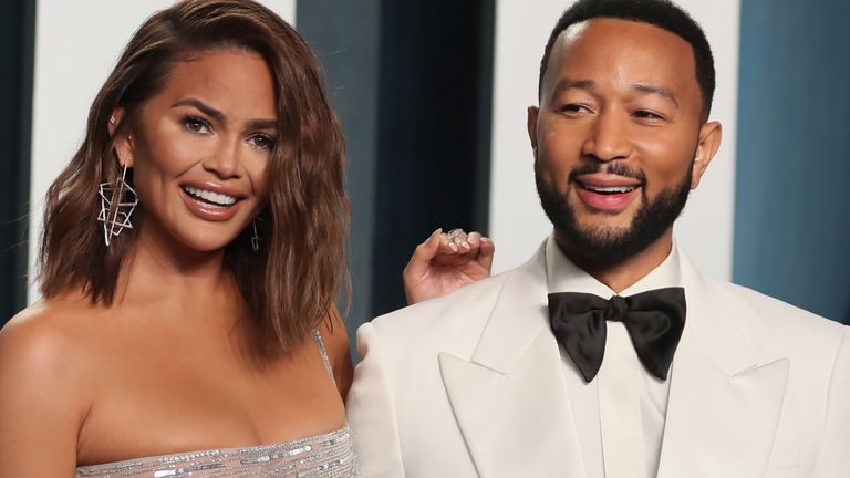 John Legend (right) said he was proud of his &#39;strong beautiful wife&#39; for staying sober