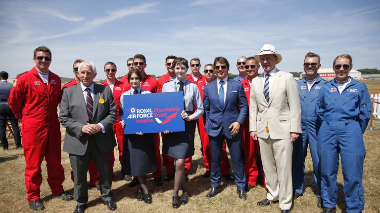  Tom Cruise with members of the RAF Red Arrows display team and RAF Air Cadets