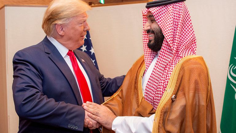 FILE PHOTO: Saudi Arabia's Crown Prince Mohammed bin Salman shakes hands with U.S. President Donald Trump, at the G20 leaders summit in Osaka, Japan, June 29, 2019. Bandar Algaloud/Courtesy of Saudi Royal Court/Handout via REUTERS ATTENTION EDITORS - THIS PICTURE WAS PROVIDED BY A THIRD PARTY./File Photo