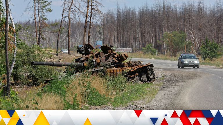 A destroyed tank alongside the road outside the city of Sievierodonetsk in the Luhansk Region, Ukraine