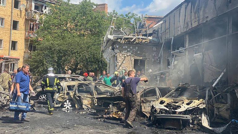 In this photo provided by Ukraine Emergency Services, rescuers work at the scene of damage caused by a shelling of a building in Vinnytsia, Ukraine, Thursday, July 14, 2022. Ukraine Emergency Services. / AP