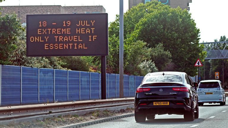 A weather travel warning for Monday and Tuesday is displayed on a road information panel on the A13 near Beckton in east London. Temperatures are predicted to hit 31C across central England on Sunday ahead of record-breaking highs next week. Picture date: Sunday July 17, 2022.

