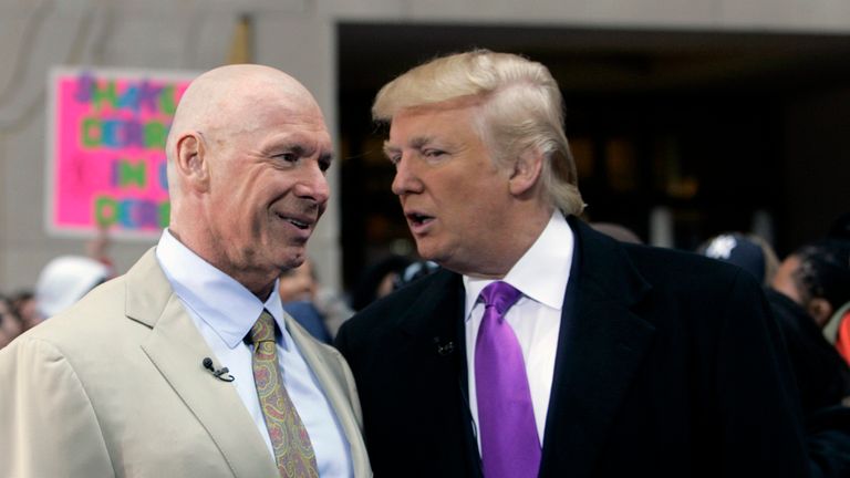 Television personality and real estate developer Donald Trump (R) and World Wrestling Entertainment owner Vince McMahon talk during a segment of NBC's 