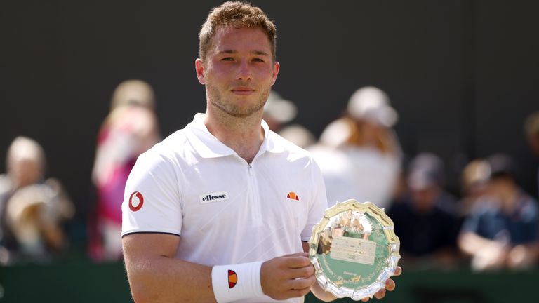Alfie Hewett poses with his trophy his match against Shingo Kunieda during The Final of the Gentlemen&#39;s Wheelchair Singles on day fourteen of the 2022 Wimbledon Championships at the All England Lawn Tennis and Croquet Club, Wimbledon. Picture date: Sunday July 10, 2022.