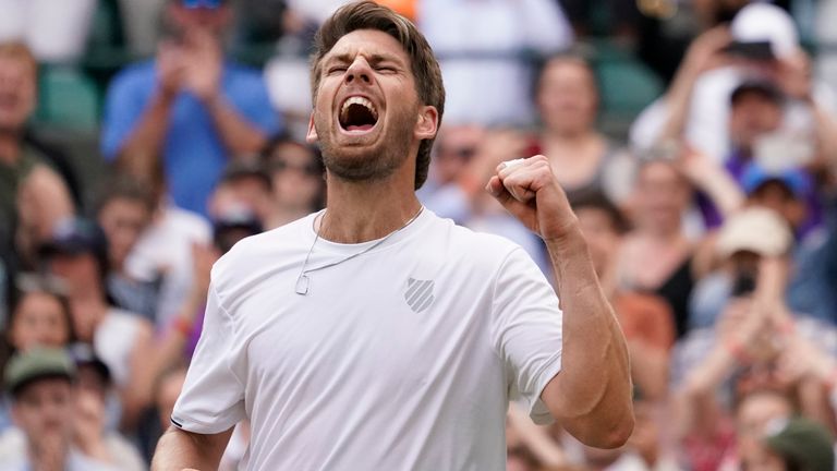 Britain&#39;s Cameron Norrie celebrates defeating Tommy Paul of the US in a men&#39;s fourth round singles match on day seven of the Wimbledon tennis championships in London, Sunday, July 3, 2022. (AP Photo/Alberto Pezzali)