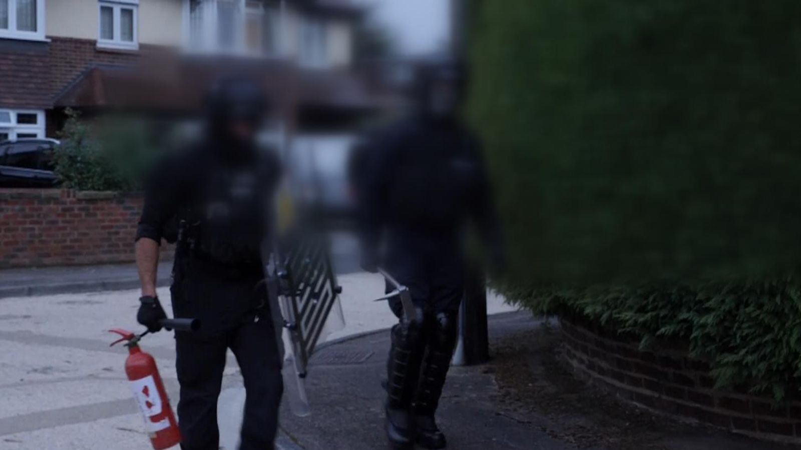 Priti Patel watches as police raid property in Surrey | UK News | Sky News