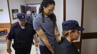U.S. basketball player Brittney Griner, who was detained at Moscow's Sheremetyevo airport and later charged with illegal possession of cannabis, is escorted after the court's verdict in Khimki outside Moscow, Russia August 4, 2022. REUTERS/Evgenia Novozhenina 