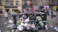 Bins and litter in the Grassmarket in Edinburgh city centre. Cleansing workers at the City of Edinburgh Council are on an eleven day strike. Picture date: Monday August 22, 2022.