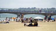 People enjoying the hot weather on Bournemouth beach after temperatures topped 40C in the UK for the first time ever. Picture date: Wednesday July 20, 2022.