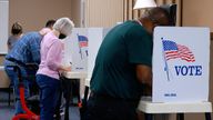 Voters mark their ballots during the primary election and abortion referendum at a Wyandotte County polling station in Kansas City, Kansas