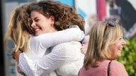 Millie Clark hugging a person after reading their A-level results at Norwich School, Norwich. Picture date: Thursday August 18, 2022.

