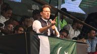 Pakistani opposition leader Imran Khan addresses his party supporters during a rally in Lahore on 13 August