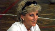 FILE - In this Saturday, Aug. 9, 1997 file photo, Diana, Princess of Wales, sits and talks to members of a Zenica volleyball team who have suffered injuries from mines, during her visit to Zenica, Bosnia. For someone who began her life in the spotlight as “Shy Di,” Princess Diana became an unlikely, revolutionary during her years in the House of Windsor. She helped modernize the monarchy by making it more personal, changing the way the royal family related to people. By interacting more intimate