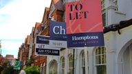 London, UK-June 8, 2021: Real estate agent "To let" signs in front of terrace house in London.