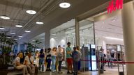 People line up to enter an H&M shop and buy items on sale in the Aviapark shopping mall in Moscow, Russia, Tuesday, Aug. 9, 2022.  
PIC:AP