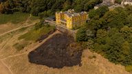 The burned patch of a grass fire is seen at Stoke Park, Bristol. The Met Office has issued an amber warning for extreme heat covering four days from Thursday to Sunday for parts of England and Wales. Picture date: Saturday August 13, 2022.