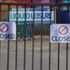 Closed signs on the locked gates at Liquid Leisure waterpark in Windsor, Berkshire, following the death of an 11-year-old girl on Saturday. Picture date: Tuesday August 9, 2022.