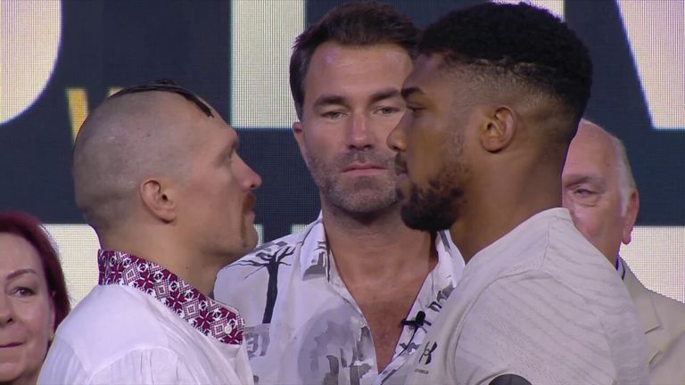 Oleksandr Usyk and Anthony Joshua refuse to break intense 107-second face-off!