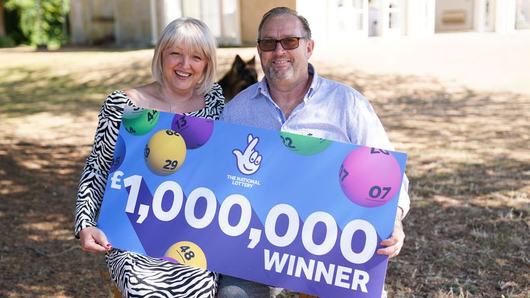 NHS worker Maxine Lloyd and her fiance Wayne Tilbury, from Kettering, celebrate her £1 million win on one of the National Lottery&#39;s instant win games at Barton Hall Hotel in Kettering, Northamptonshire, which became a double-celebration when she received the all-clear for breast cancer a few days later. Picture date: Tuesday August 9, 2022.

