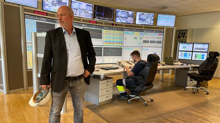 Bexbach power plant manager Michael Lux standing in control room 