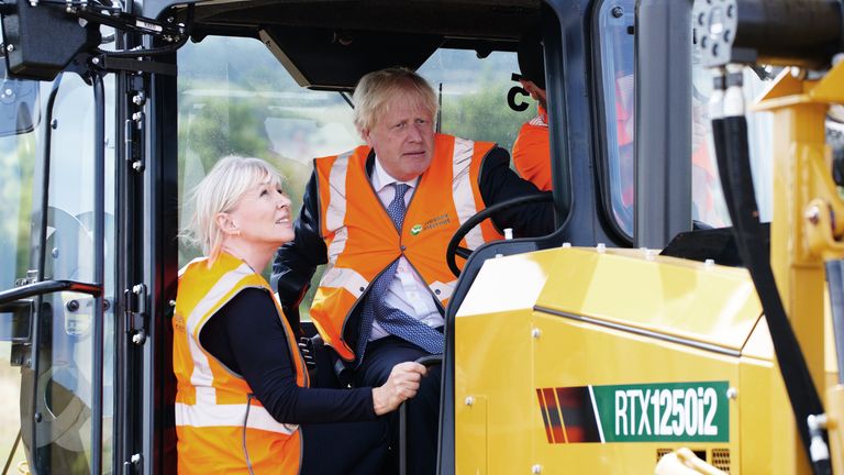 Prime Minister Boris Johnson and Culture Secretary Nadine Dorries during a visit to Henbury Farm in north Dorset, where Wessex Internet are laying fibre optics in the field. His visit marks new data showing that 70 percent of the UK is now benefiting from gigabit broadband coverage. Picture date: Tuesday August 30, 2022.


