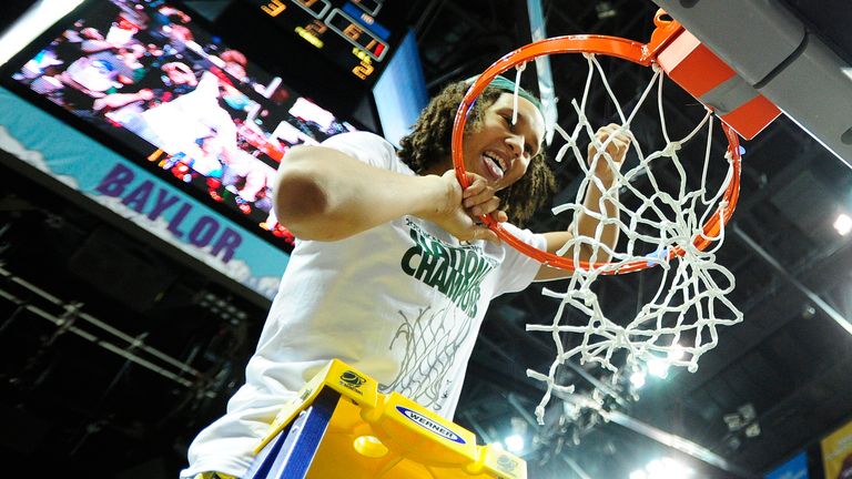 Baylor Bears&#39; Brittney Griner cuts a piece of the net after they defeated the Notre Dame Fighting Irish in their women&#39;s NCAA Final Four championship college basketball game in Denver, Colorado, April 3, 2012. REUTERS/Mark Leffingwell (UNITED STATES - Tags: SPORT BASKETBALL)
