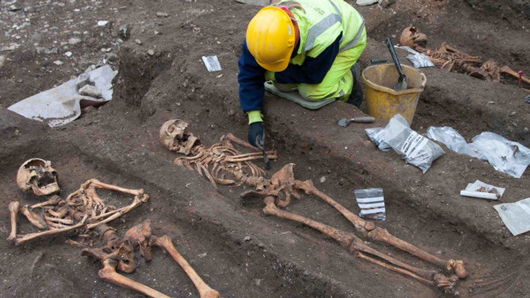 Archaeologists from the Cambridge Archaeological Unit excavate the remains of friars buried in the grounds of the former Augustinian friary in central Cambridge. Pic: Cambridge Archaeological Unit.