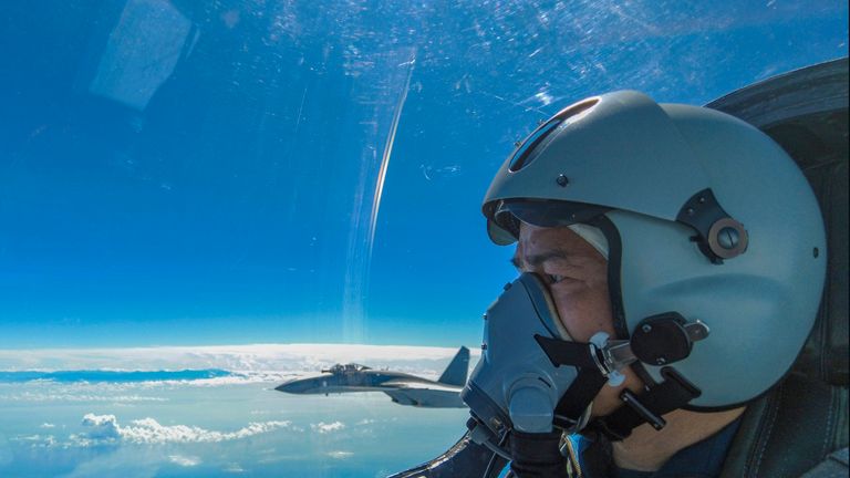 In this photo released by Xinhua News Agency, an air force pilot from the Eastern Theater Command of the Chinese People&#39;s Liberation Army (PLA) looks as they conduct a joint combat training exercises around the Taiwan Island on Sunday, Aug. 7, 2022. 
PIC:Xinhua /AP