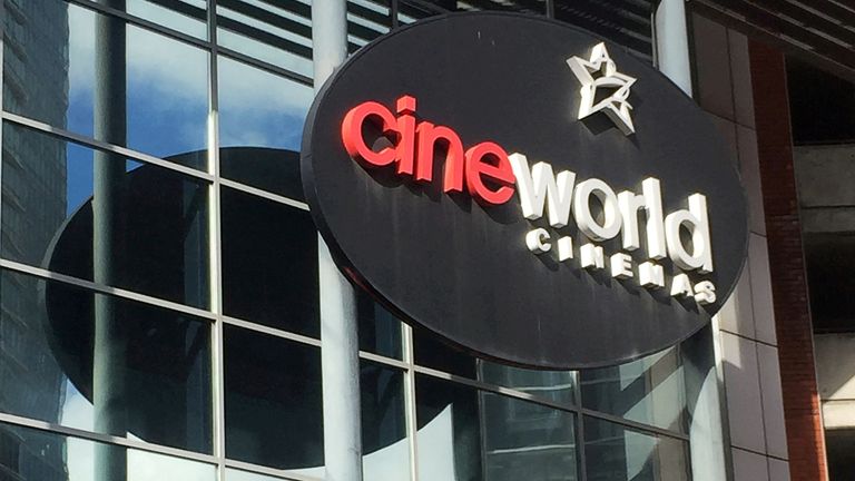 FILE PHOTO: A Cineworld cinema logo is pictured in Canary Wharf in London, Britain, March 11, 2020. REUTERS/Keith Weir/File Photo