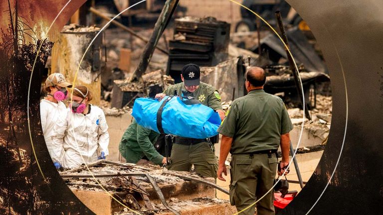 Sheriff's Deputy Johnson carries remains of a McKinney Fire victim from a destroyed home on Monday, Aug. 1, 2022, in Klamath National Forest, Calif. (AP Photo/Noah Berger)