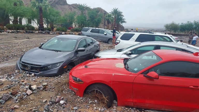 A view shows debris from monsoonal rains and immobilized cars, belonging to visitors and park staff in Death Valley National Park, at the Inn at Death Valley, California, U.S., August 5, 2022. National Park Service/Handout via REUTERS THIS IMAGE HAS BEEN SUPPLIED BY A THIRD PARTY