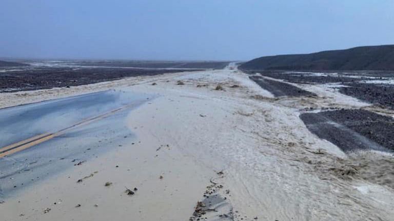 In this photo provided by the National Park Service, Highway 190 is closed due to flash flooding in Death Valley National Park, Calif., Friday, Aug. 5, 2022. Heavy rainfall triggered flash flooding that closed several roads in Death Valley National Park on Friday near the California-Nevada line. The National Weather Service reported that all park roads had been closed after 1 to 2 inches of rain fell in a short amount of time. (National Park Service via AP)