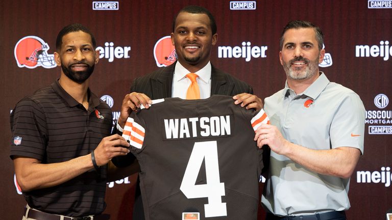 Mar 25, 2022; Berea, OH, USA; Cleveland Browns quarterback Deshaun Watson poses for a photo with general manager Andrew Berry, left and head coach Kevin Stefanski, right during a press conference at the CrossCountry Mortgage Campus. Mandatory Credit: Ken Blaze-USA TODAY Sports
