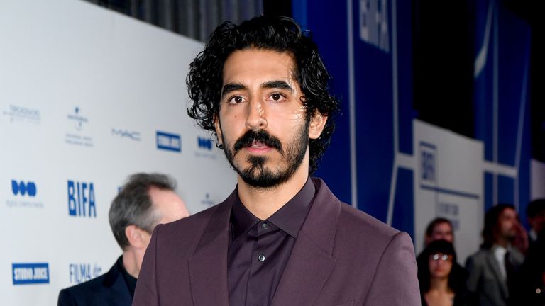 Dev Patel was pictured talking to police after the stabbing on Monday night in Adelaide, Australia