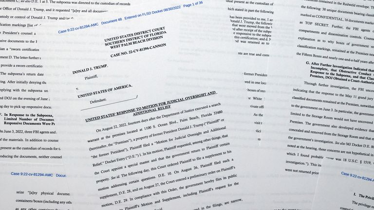 Pages from a Department of Justice court filed August 30, 2022, in response to a request from former President Donald Trump's legal team for a special master to review documents seized during the August 8 search in Mar-a-Lago , photographed early Wednesday August 31, 2022. (AP Photo / Jon Elswick)