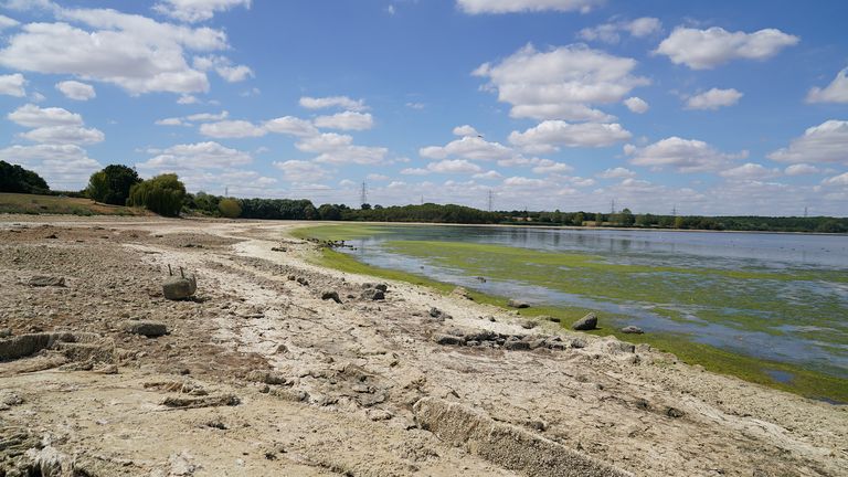 Dry earth on the banks of Grafham Water near Huntingdon in Cambridgeshire, where water is receding during the drought. Britain is braced for another heatwave that will last longer than July&#39;s record-breaking hot spell, with highs of up to 35C expected next week. Picture date: Monday August 8, 2022.