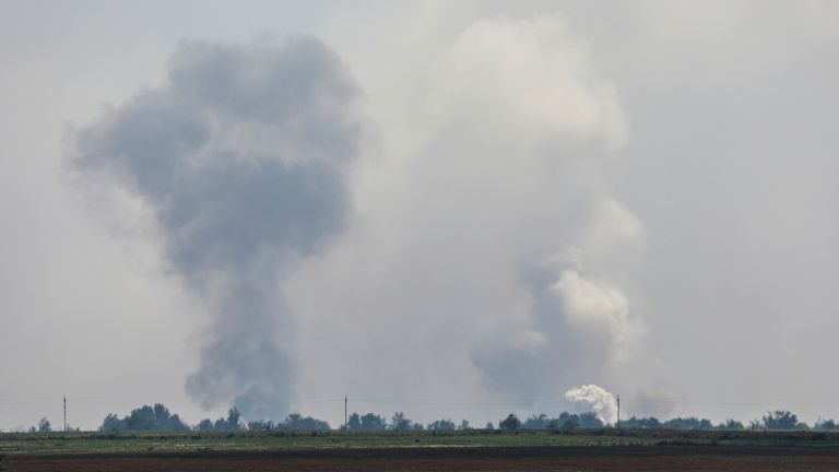 A view shows smoke rising above the area following an alleged explosion in the village of Mayskoye in the Dzhankoi district, Crimea, August 16, 2022. REUTERS/Stringer
