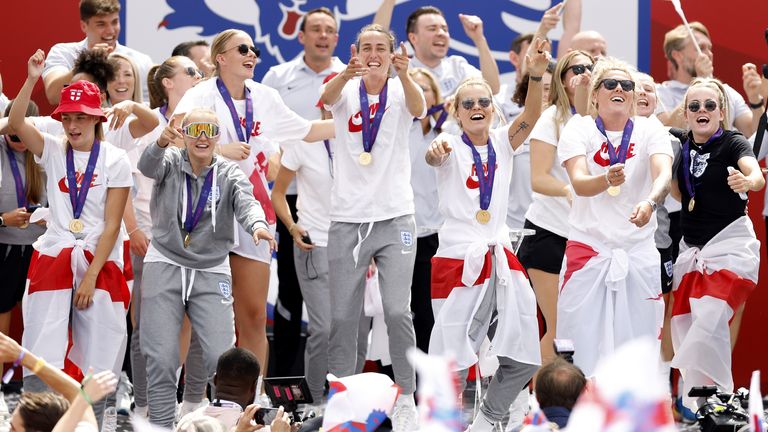 England players sing Sweet Caroline on stage during a fan celebration in Trafalgar Square