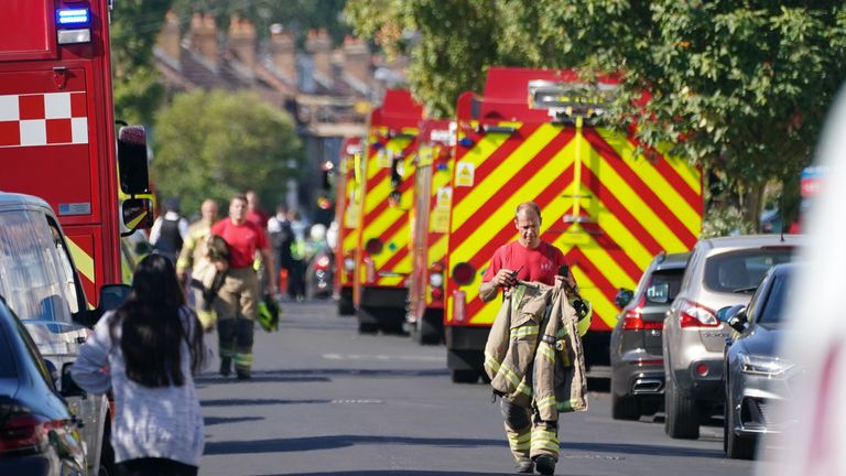 Emergency services at the scene in Galpin's Road in Thornton Heath, south London, where the London Fire Brigade (LFB) report that a house has collapsed amid a fire and explosion. Picture date: Monday August 8, 2022.

