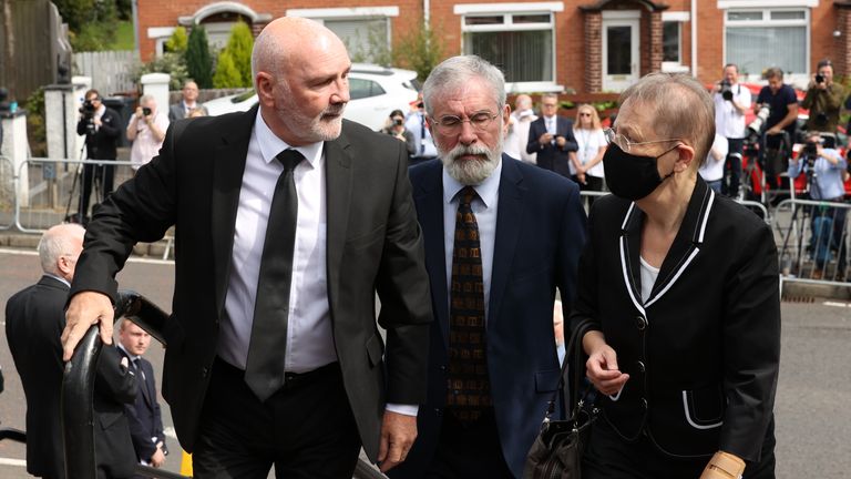 (left to right) Speaker of the Northern Ireland Assembly Alex Maskey, former Sinn Fein President Gerry Adams, and Barbara De Brun, arrives for the funeral of former Northern Ireland first minister and UUP leader David Trimble, who died last week aged 77, at Harmony Hill Presbyterian Church, Lisburn. Picture date: Monday August 1, 2022.


