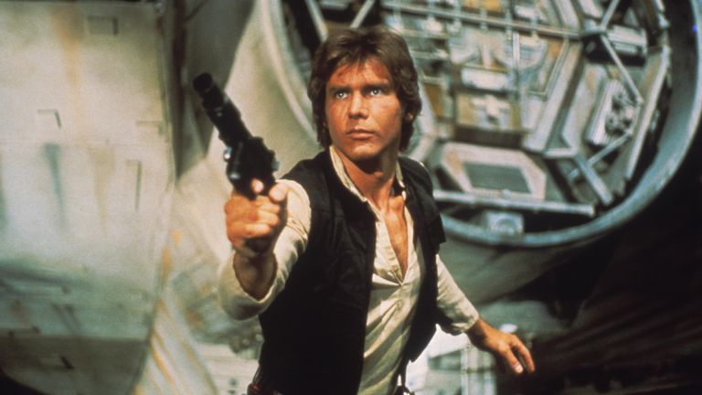 Harrison Ford as Han Solo, blaster in hand, in Star Wars: A New Hope