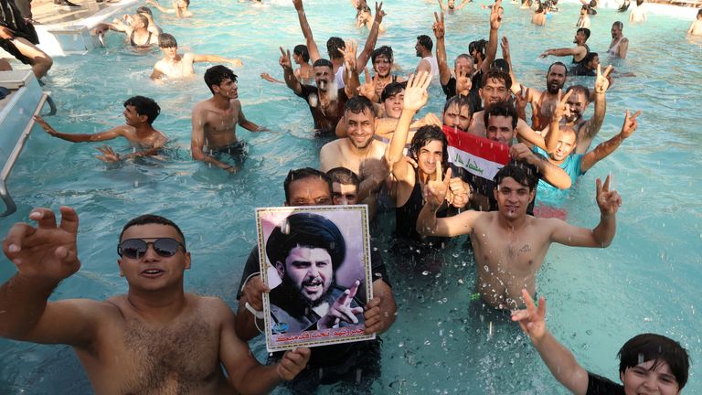 Supporters of Iraqi populist leader Moqtada al-Sadr protest at the Green Zone, in Baghdad, Iraq August 29, 2022. REUTERS/Alaa Al-Marjani