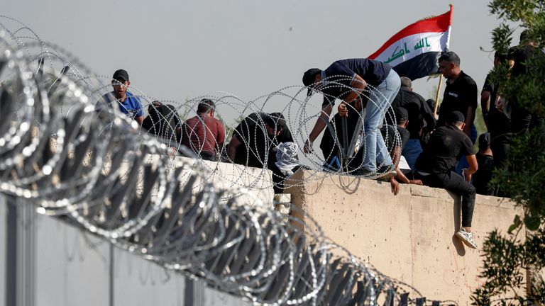 Supporters of Iraqi populist leader Moqtada al-Sadr protest at the Green Zone, in Baghdad, Iraq August 29, 2022. REUTERS/Alaa Al-Marjani