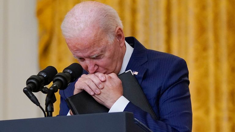 President Biden pauses as he is asked about bombings at Kabul airport that killed at least 12 service members just before the evacuation