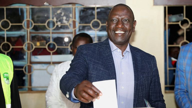 Kenya&#39;s Deputy President and presidential candidate William Ruto casts his vote during the general elections, at Kosachei Primary School, Kenya August 9, 2022. REUTERS/Baz Ratner
