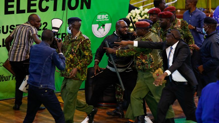 Members of the opposition engage in a scuffle with security officials as they block the IEBC President from announcing the election results at the IEBC National Vote Counting Center in the Bomas of Kenya, in Nairobi, Kenya today. August 15, 2022. REUTERS / Monicah Mwangi