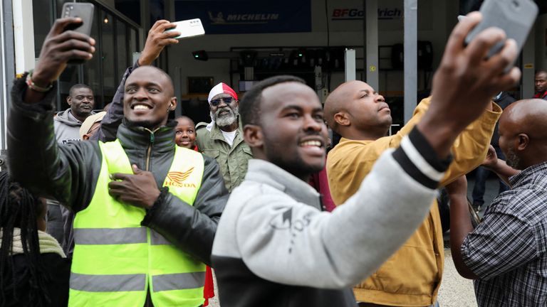 Supporters take a selfie with Kenyan presidential candidate George Wajackoyah in Karen, Kenya, August 3, 2022. REUTERS / Baz Ratner