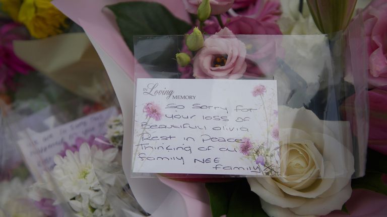 Floral tributes are left near to the scene of an incident in Kingsheath Avenue, Knotty Ash, Liverpool, where nine-year-old Olivia Pratt-Korbel was fatally shot on Monday night. Picture date: Friday August 26, 2022.

