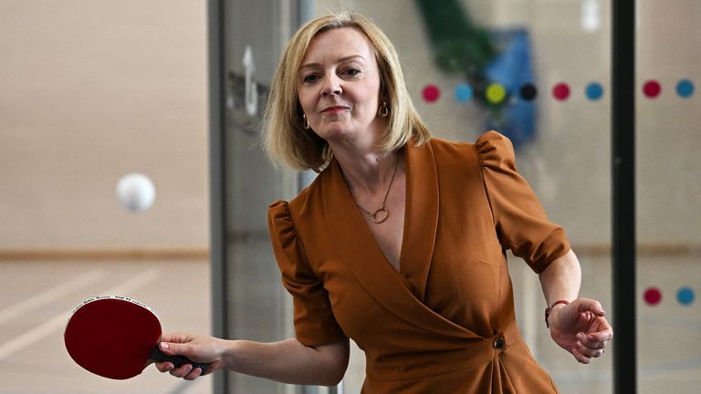 Embargoed to 2230 Monday August 8 Conservative Party leadership candidate Liz Truss plays table tennis during a visit to the Onside Future Youth Zone in London. Picture date: Monday August 8, 2022.
